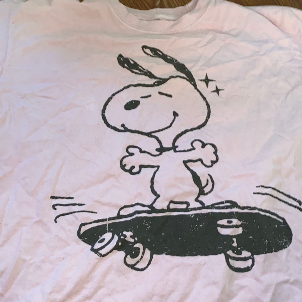 This peanut shirt only been worn once and is a size medium in girl